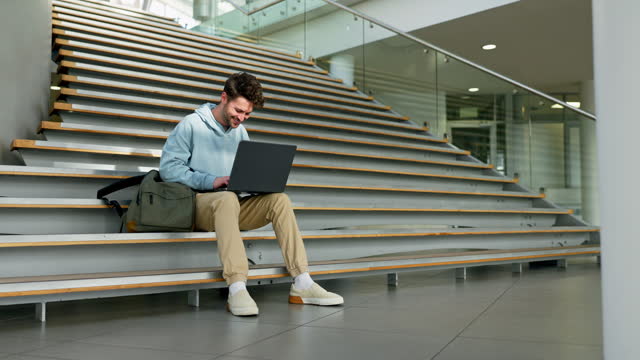 Laptop, assignment and student man on a staircase at university for education, learning or study. Computer, college or school with a person online for research or homework during academic scholarship