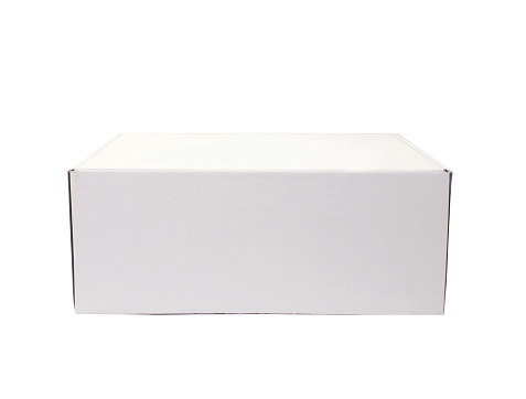 White paper box isolated on white background. Packaging mockup. Blank template. Closed rectangular packaging. Front view. Photo.