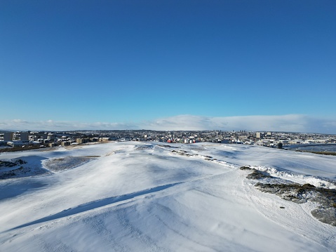 A snowstorm over Aberdeen, Scotland from a drone view.