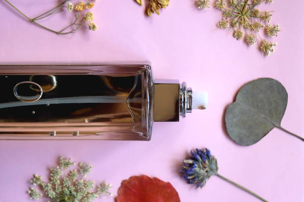 istock Perfume Bottle and Pressed Flowers 1957529066