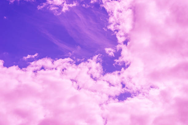 istock Beautiful dramatic pink cloud sky purple and violet tones Background.Toned. 1957538022
