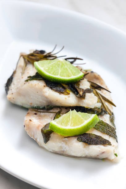 istock white fish fillet baked with herbs 1957540219