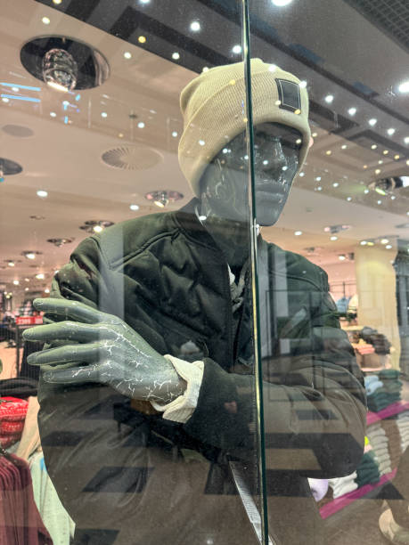 istock A mannequin in a clothing store window 1957541818