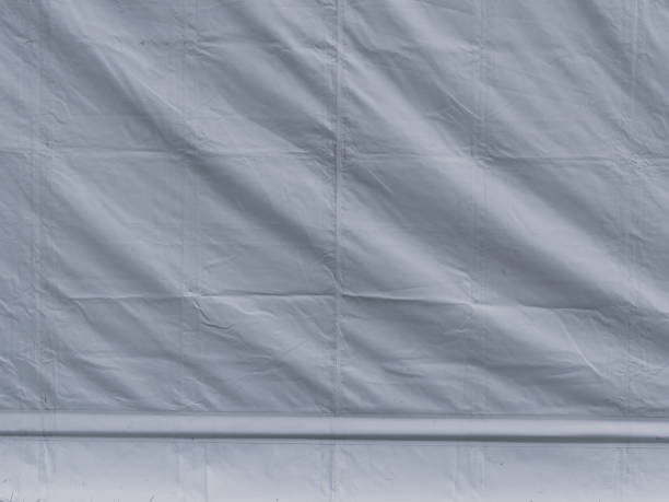 istock Light background white tarpaulin 1957550292