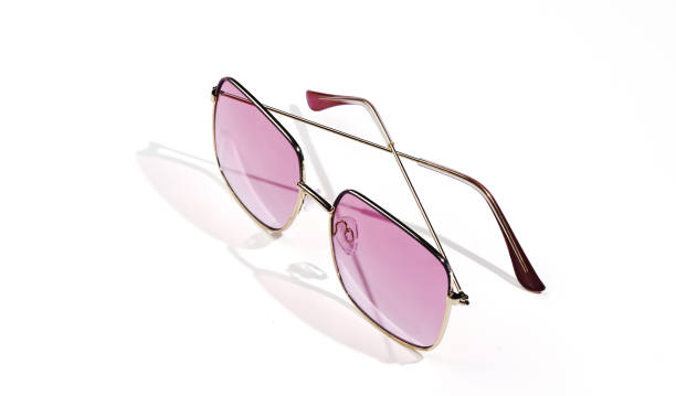 istock Pink sunglasses isolated on white background. 1957551347