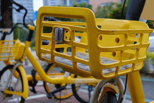 Yellow shared bike basket
