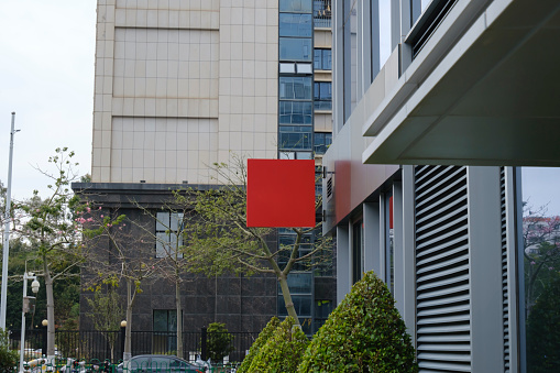 Red sign under the office building