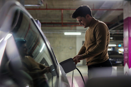 Electric Vehicle Charging Station in indoor Parking Lot , Renewable And Sustainable Energy