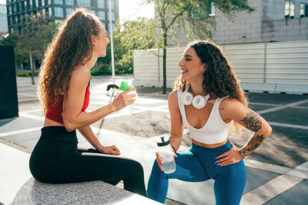 istock Lgbt couple training together outdoor 1957618166