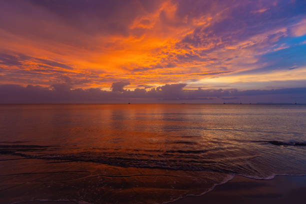 Orange sunset on the beach of Thailand
