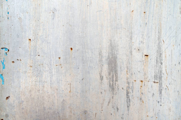 Old rustic weathered white painted colored metal wall textured background
