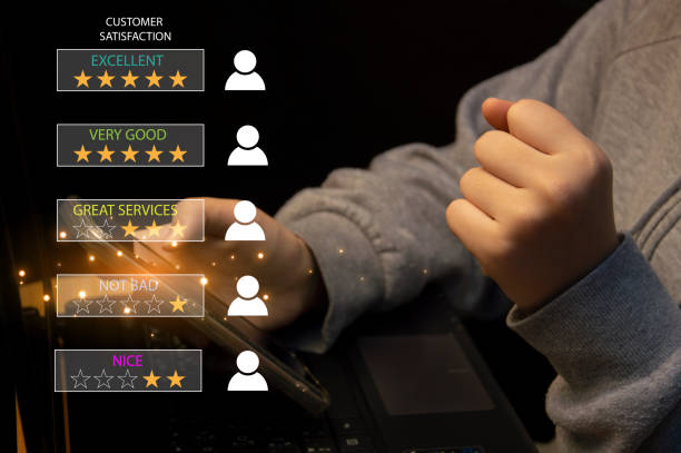 istock User give rating to service experience on online application for Customer review satisfaction feedback survey concept. 1957652105