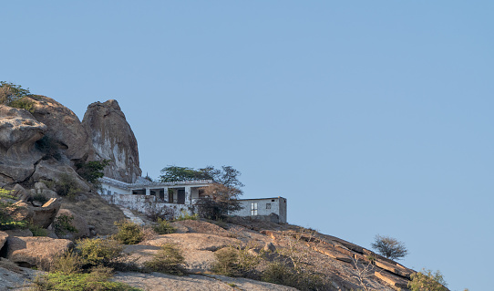Perwa Hill Shiva Temple in the dramatic boulder covered landscape in the Jawai Region of Rajasthan, India Asia.
