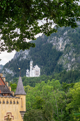 View of Neuschwanstein castle from the garden of  Hohenschwangau castle.