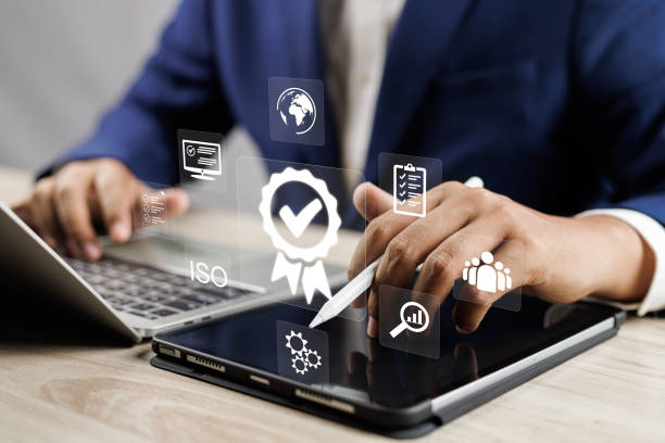 istock ISO quality control, Businessman using laptop for product quality certificate and document icon for ISO or International standard, Top service and quality assurance, Guarantee. 1957659111