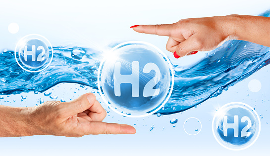 Clean Hydrogen Energy concept of environmentally friendly energy showing bubbles with H2 sign