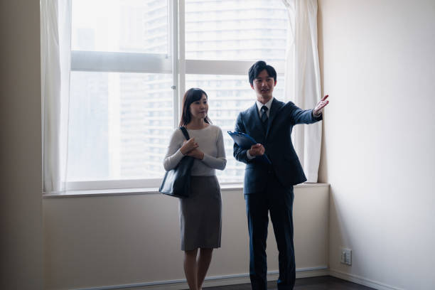 istock Young woman viewing a property 1957723293