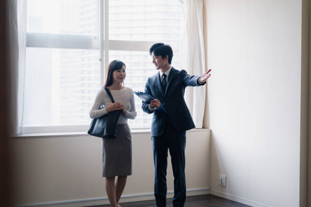 istock Young woman viewing a property 1957723296
