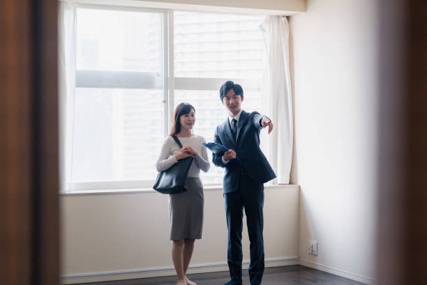 istock Young woman viewing a property 1957723297
