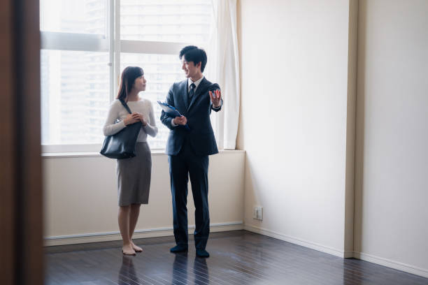 istock Young woman viewing a property 1957723302