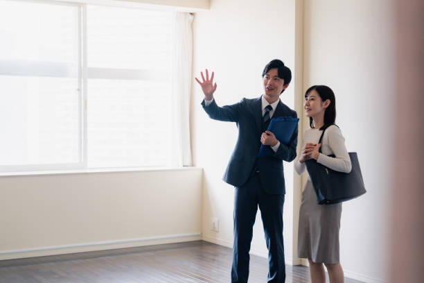 istock Young woman viewing a property 1957723308