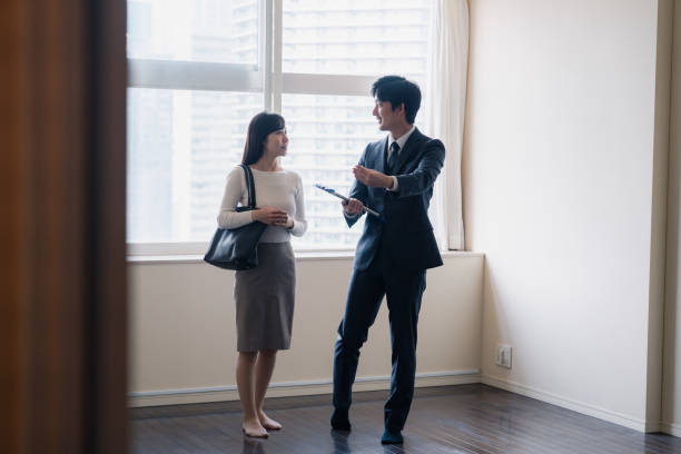 istock Young woman viewing a property 1957723309