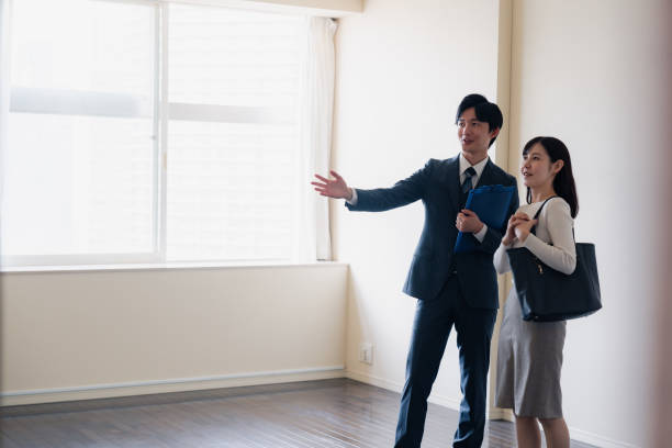 istock Young woman viewing a property 1957723318