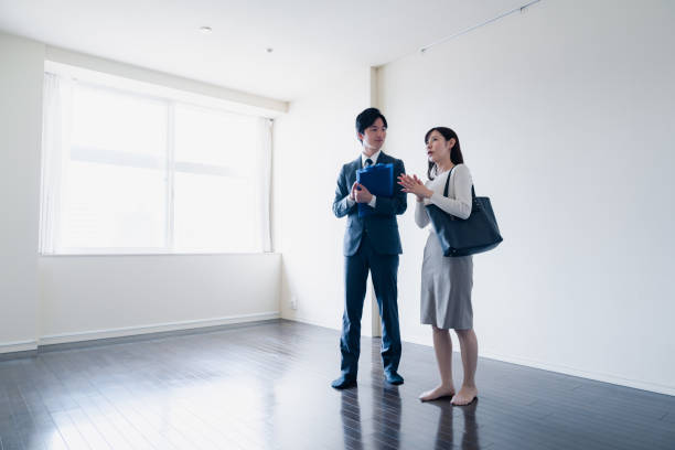 istock Young woman viewing a property 1957723321