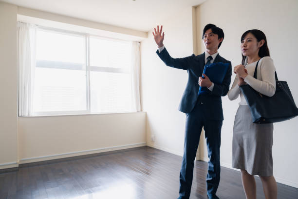 istock Young woman viewing a property 1957723324