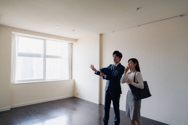 istock Young woman viewing a property 1957723332