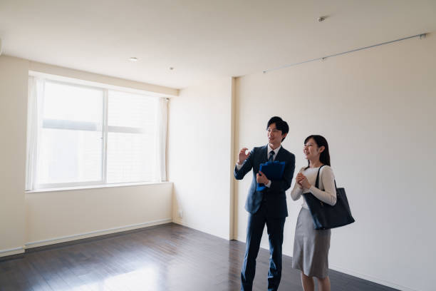 istock Young woman viewing a property 1957723340