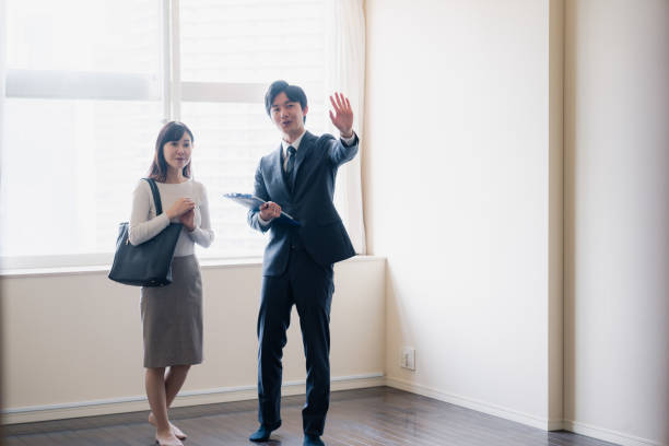 istock Young woman viewing a property 1957723875