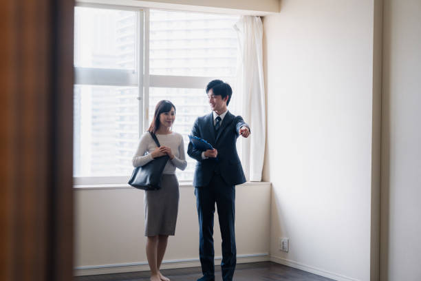 istock Young woman viewing a property 1957723876