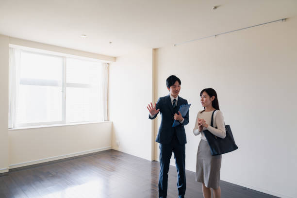 istock Young woman viewing a property 1957723885