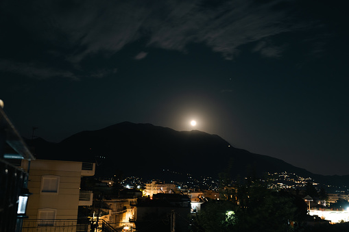 Moon over Mount taygetus in Kalamata, Greece