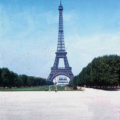 The Eiffel tower stands tall on a hot summers day in 1969