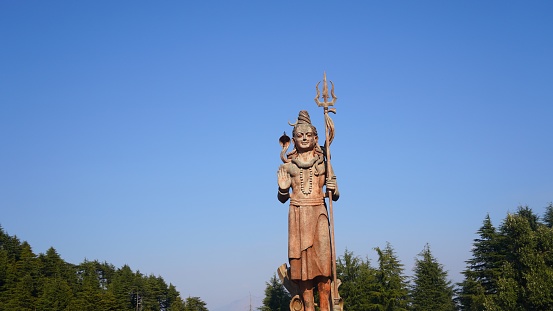 big statue of god shiv holding trishul