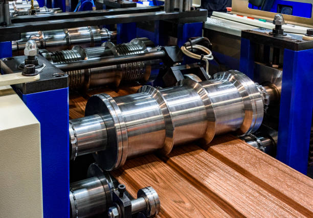 Close-up of a production line for manufacturing corrugated sheet metal
