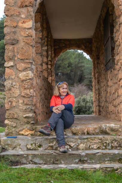 istock Resting Hiker at Stone Shelter Entrance 1957875299