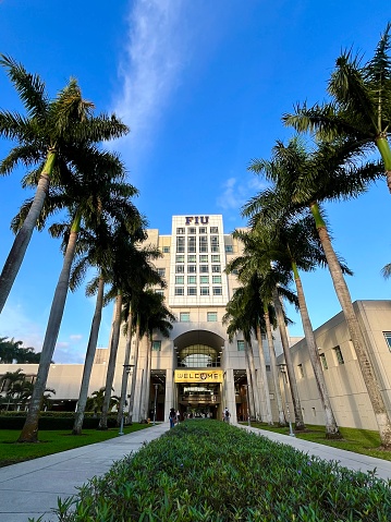 Miami, Florida, USA - January 23, 2024: Principal facade of Florida International University FIU in Miami, Florida. \n\nFIU is the largest university in South Florida, the second-largest in Florida, and the fourth-largest in the United States by enrollment. FIU is classified as a research university with highest research activity.
