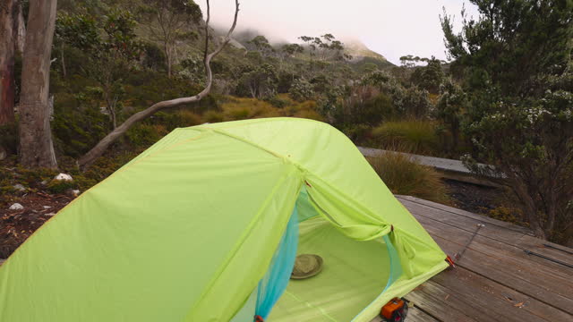 Wilderness Haven: Camping on a Wooden Platform in Tasmania's Untamed Backcountry