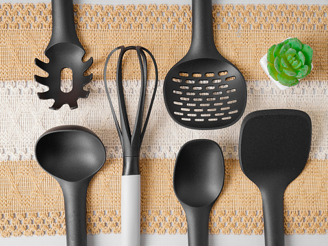 Silicon cooking utensil set including slotted spoon, slotted turner, pasta server, slotted spatula, deep soup ladle, solid spoon, kitchen tongs, egg whisk, basting brush, spreader spatula, hooks, holder. This is convenience for taking out tools easily and they are non-stick heat resistant cookware.