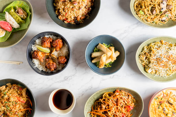 istock An overhead view captures a table brimming with an array of delectable Asian dishes 1957923903
