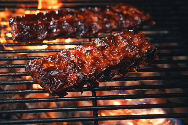 istock BBQ Pork Spareribs on Barbecue Grill 1958020420