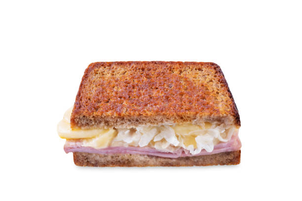istock Reuben sandwich with ham, sauerkraut and cheese on a white isolated background 1958049366