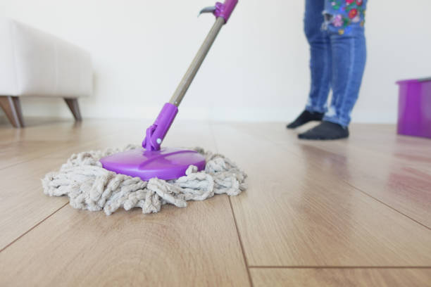 istock cleaning tiles floor with mop 1958052046
