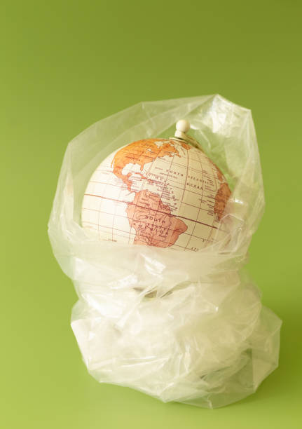 istock A globe of the earth in a plastic bag. Vertical 1958055179