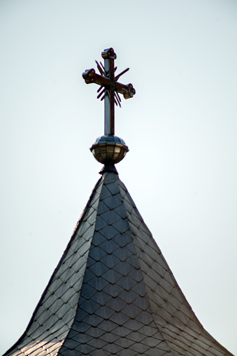 The tower of the Vaca monastery. Spire agains the clear sky.