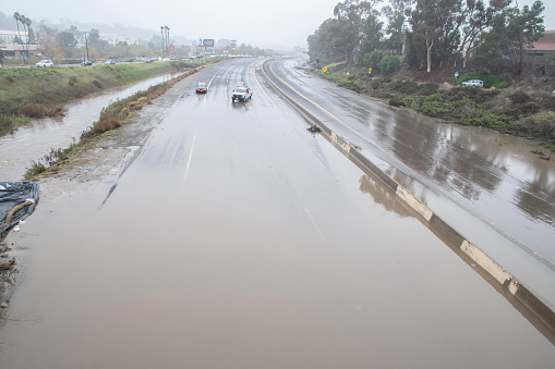Oceanside, California, USA - January 22, 2024: All lanes of both sides of the 78 freeway were shut down after heavy rains caused the portion of the freeway at El Camino Real to be flooded