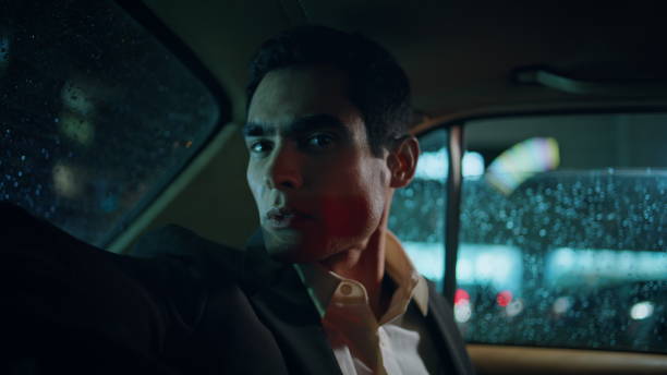 istock Elegant model sitting auto evening portrait. Serious business man looking camera 1958066145